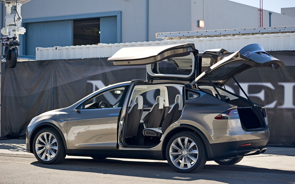 tesla-model-x-rear-three-quarter-doors-open.jpg